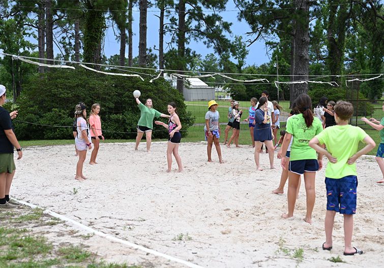 playing volley ball outdoors